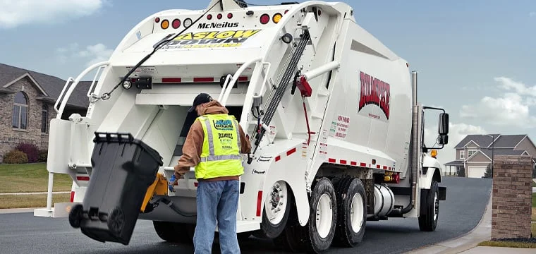 McNeilus Tag Axle Series rear loader with lift axle